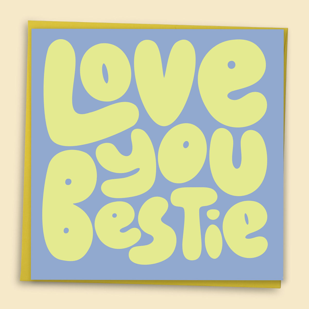 Card with light yellow 'Love you bestie' text finished with holographic foilon a blue background. Australian-made greeting card by Papernest