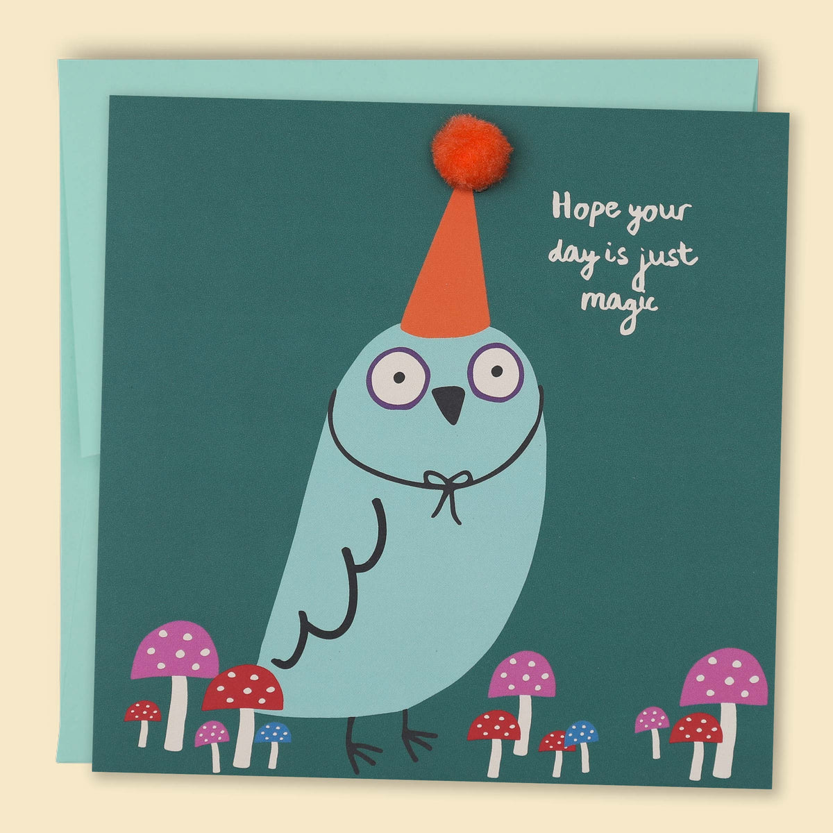 An illustrated card with a bird wearing a party hat with pom pom detail with the text "Hope your day is just magic" — Australian-made greeting card by Papernest