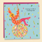 Illustrated by Constanza Goeppinger a greeting card featuring a woman in a party outfit riding a colourful disco ball holding a glass of wine, surrounded by bright confetti with the text 'Coming In Like A Wrecking Ball '. Australian-made greeting card by Papernest 