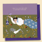 Greeting card with an illustration by Constanza Goeppinger of a person lying down on the carpet with a bottle and a cat, with text 'Don't Cry Over Spilt Milk it Could Have Been Gin'. Australian-made greeting card by Papernest.