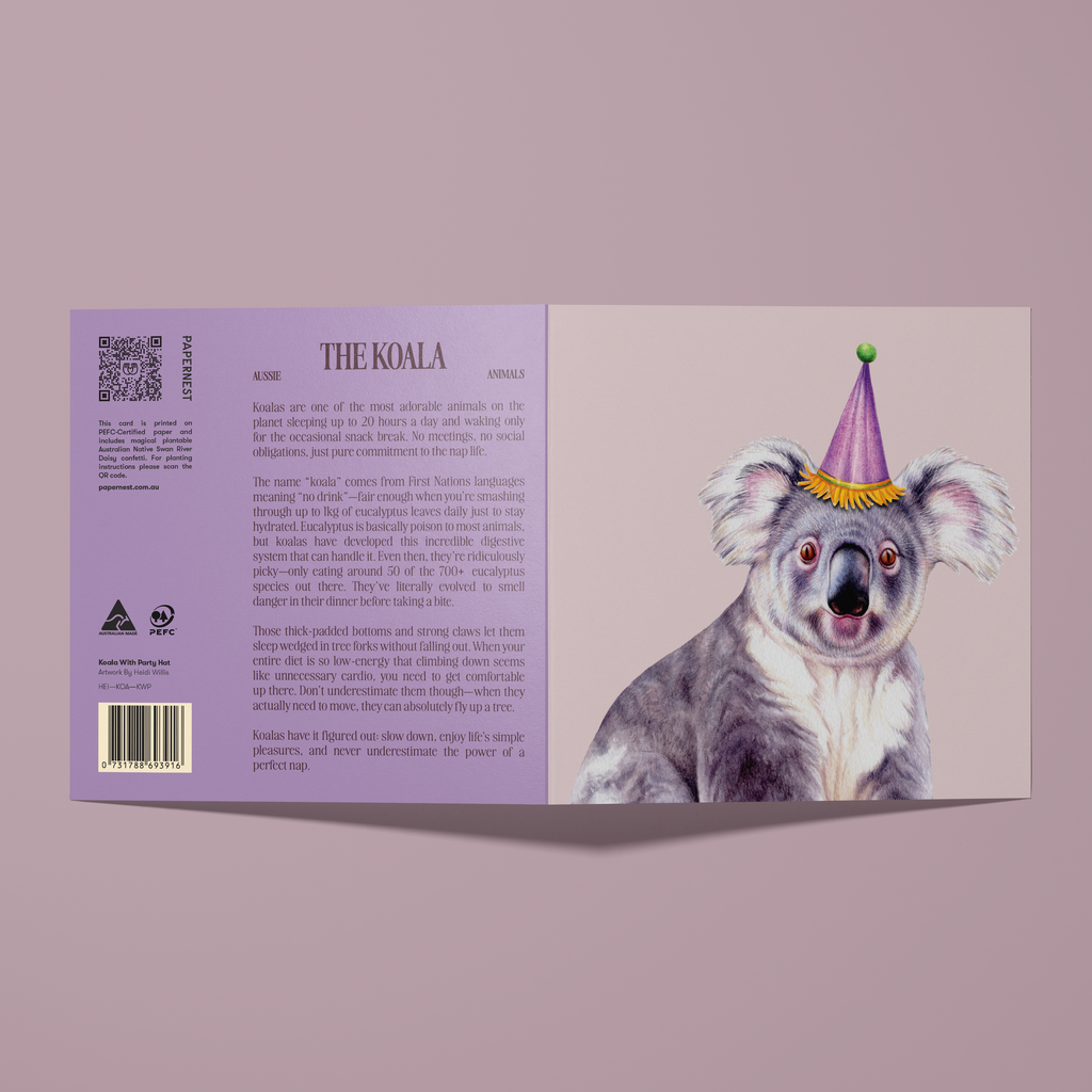 Greeting card with a koala wearing a party hat on a purple background.