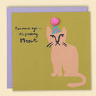 A greeting card with an illustration of a cat wearing a party hat, with the text 'You never age... it's freaking Meowt'. Australian-made greeting card by Papernest