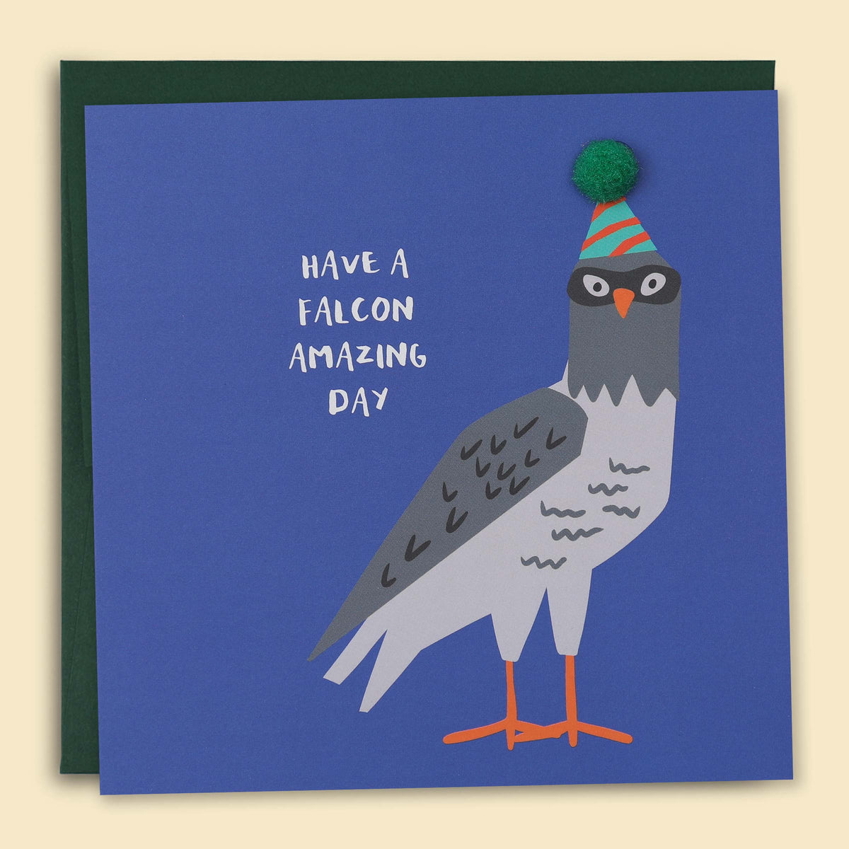 A greeting card with a illustration of a bird, presumably a falcon, wearing a party hat, with the text 'HAVE A FALCON AMAZING DAY' on a blue background — Australian-made greeting card by Papernest