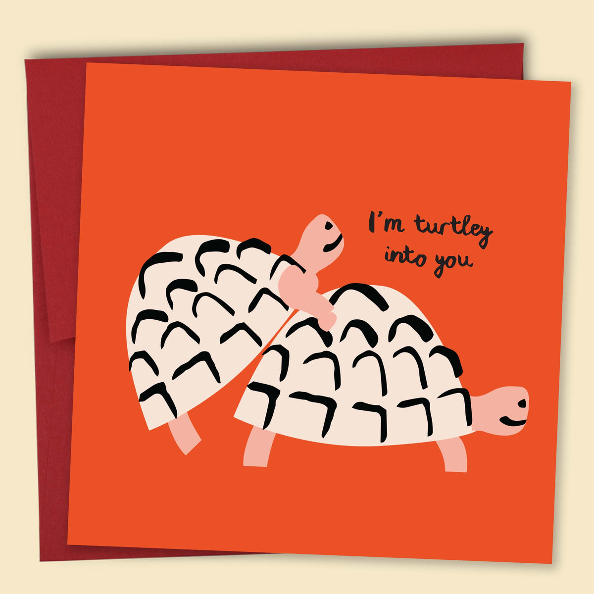 A greeting card with an illustration of two turtles and the phrase 'I'm turtley into you' — Australian-made greeting card by Papernest.